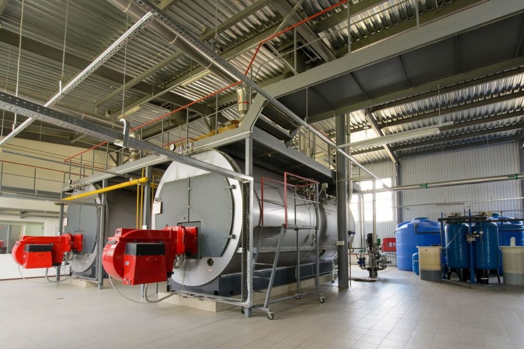 Biomass fired reciprocating grate steam boiler
